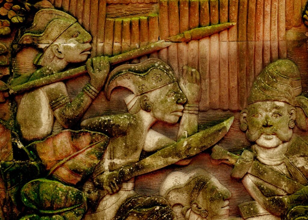 Depiction of Malay warriors of ancient Singapura on a relief in Fort Canning Park, Singapore.